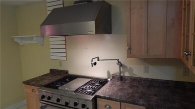 Gas cook top with pot-filler and...