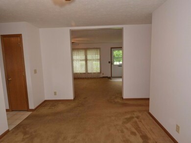 Formal dining room off of kitchen.