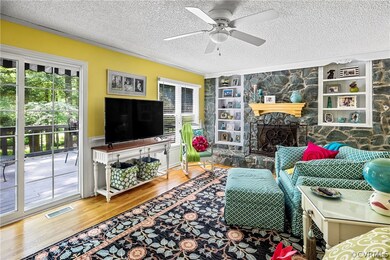Great room with view of stone fireplace.
