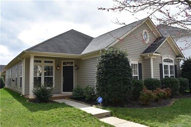 Another view of the front of the home. As you can see, the sign in the yard shows that the home has a Security System!