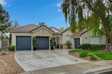 Ranch-style house with an attached garage, stucco