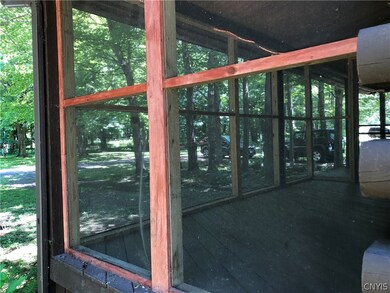 Nice size screened porch leads out onto the open p