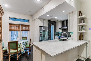 Kitchen with appliances with stainless steel finis