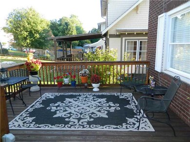 Exterior Back. Uncovered Side of Back Deck