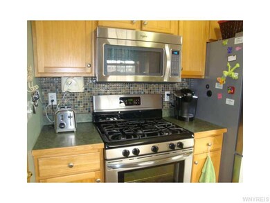 Kitchen. The five burner gas stove would be a chef