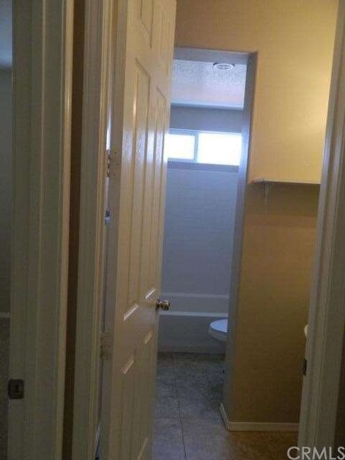 Downs stairs bedroom to the right with Full bath D
