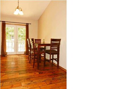 Stride across the Beautiful Hardwood floor to the 