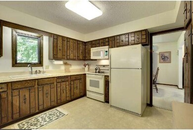 Another view of the kitchen leading to the formal 