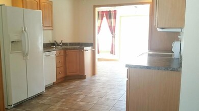 Fully appianced kitchen with tile floors