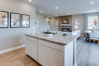 The large open concept main level makes for a great abode. *Staged Model photo, actual selections and options may vary.