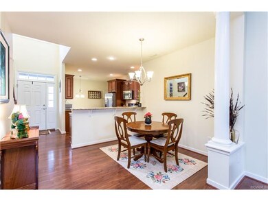 The spacious Dining Room can easily hold a larger 