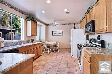 Sunny kitchen with room for everyone.