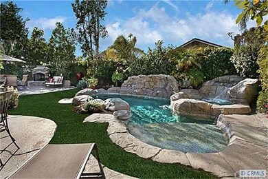 Your own private backyard oasis featuring a pebble