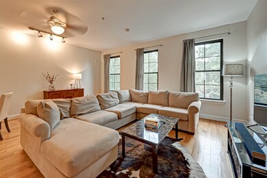 The open living room overlooks Baldwin Park