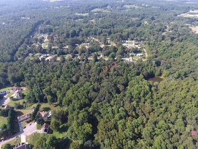 Aerial overview of property's location with a fore