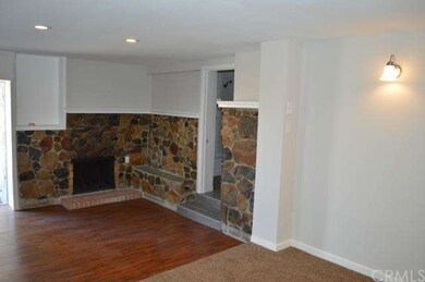 Sitting area and fireplace in master bedroom
