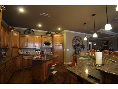 Kitchen. Unbelievable custom kitchen w/ island and bar area.  Top of the line materials throughout!