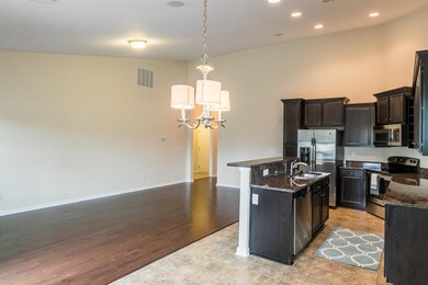Eat-in kitchen open to living