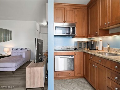 Kitchen with appliances with stainless steel finis