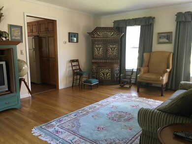Den with Hardwood Floors