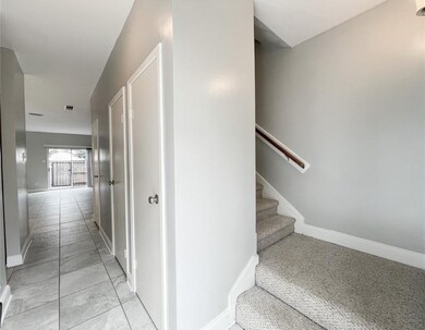 Spacious entrance that leads to the kitchen on the