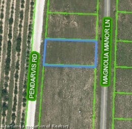 121 S Magnolia Ave, Lake Placid, FL 33852 - photo 2