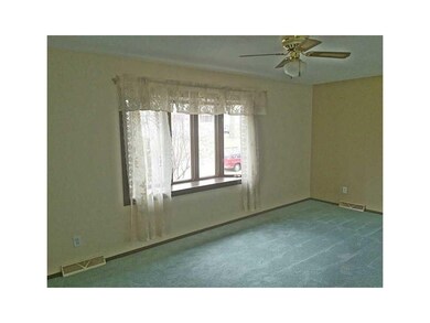 Family Room-L1. Window seat overlooking front yard