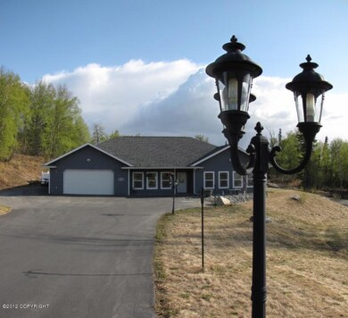 Lighted and paved driveway