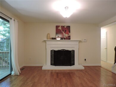 Family Room with wood burning fireplace.