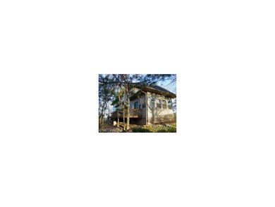 Back of house showing deck