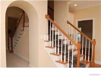 An arched entryway separates the gathering room an