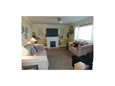 Large and sunny living area with gas fireplace, ne