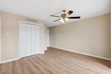 Unfurnished bedroom featuring light wood-style fl