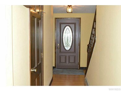 Foyer Looking down hallway into foyer and front do