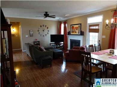 Family room has vented, gas log fireplace.
