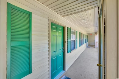 Property entrance featuring a porch