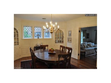 Formal Dining Space with Built-in Corner Cabinets 