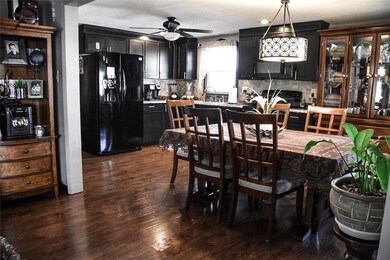 A view of the living room shows the open feel into