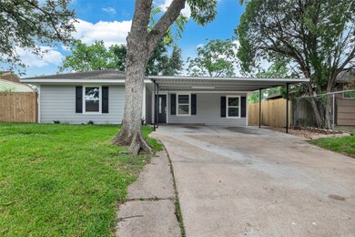 The attached carport provides ample room for parki