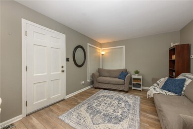 Living room featuring light hardwood / wood-style flooring