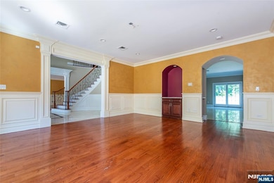 Right-side formal dining room facing forward towards kitchen.