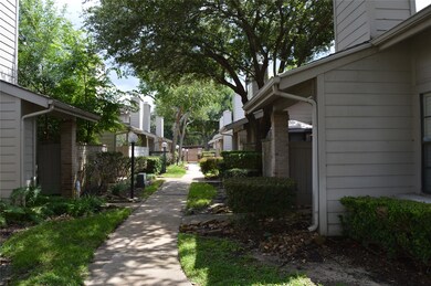 View of walkway to Unit.