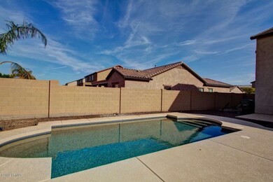 Backyard with a pool.