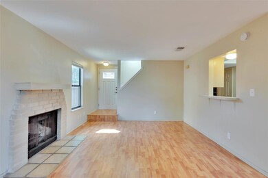 Unfurnished living room with wood finished floors
