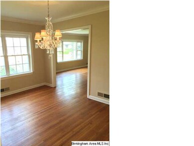 Formal dining room with double window and beautifu