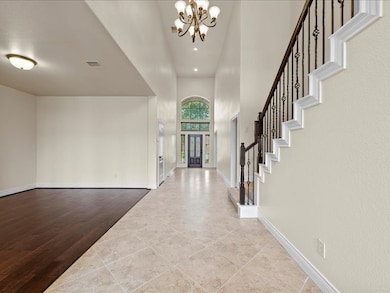 As you walk in, to your right, a cozy living room awaits.  It's the perfect spot to unwind with a book or entertain guests on cozy evenings.