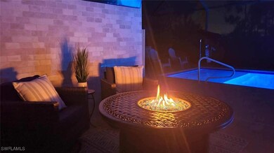 Custom lighting highlights the custom stonework in