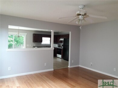 view into kitchen & dining area from great room