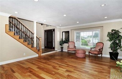 Travertine Foyer, Custom Wrought Iron Staircase Ra