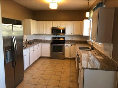 New granite countertops, and all the stainless appliances stay.